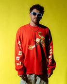 Justin Stuart posing in laugh daily apparel long sleeve tee